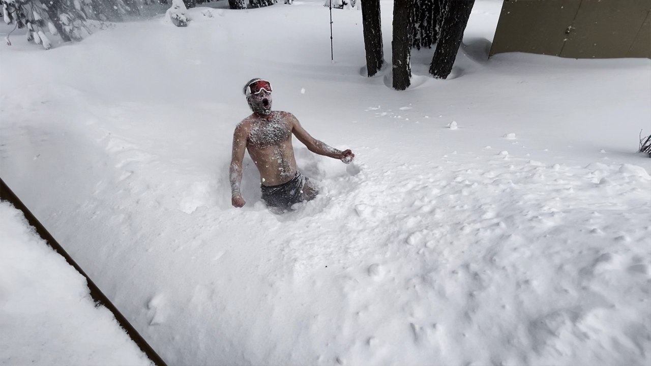 Shocking Winter Stunt: Daredevil Jumps into Snow After Historic Storm