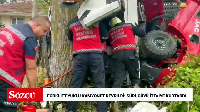 Forklift yüklü vinçli kamyonet devrildi, sıkışan sürücüyü itfaiye kurtardı