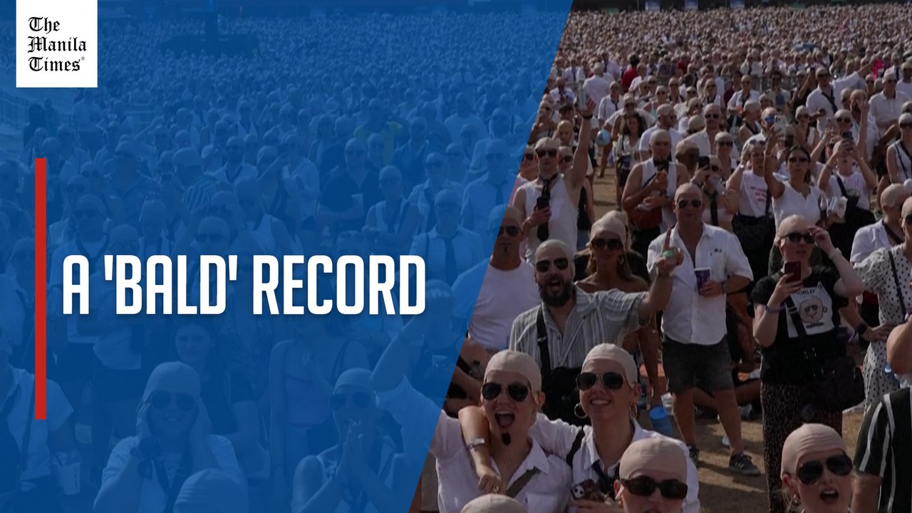 Thousands of Pitbull fans join bald cap world record attempt in London