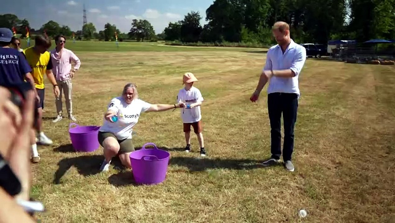 Prince Harry joins a water fight