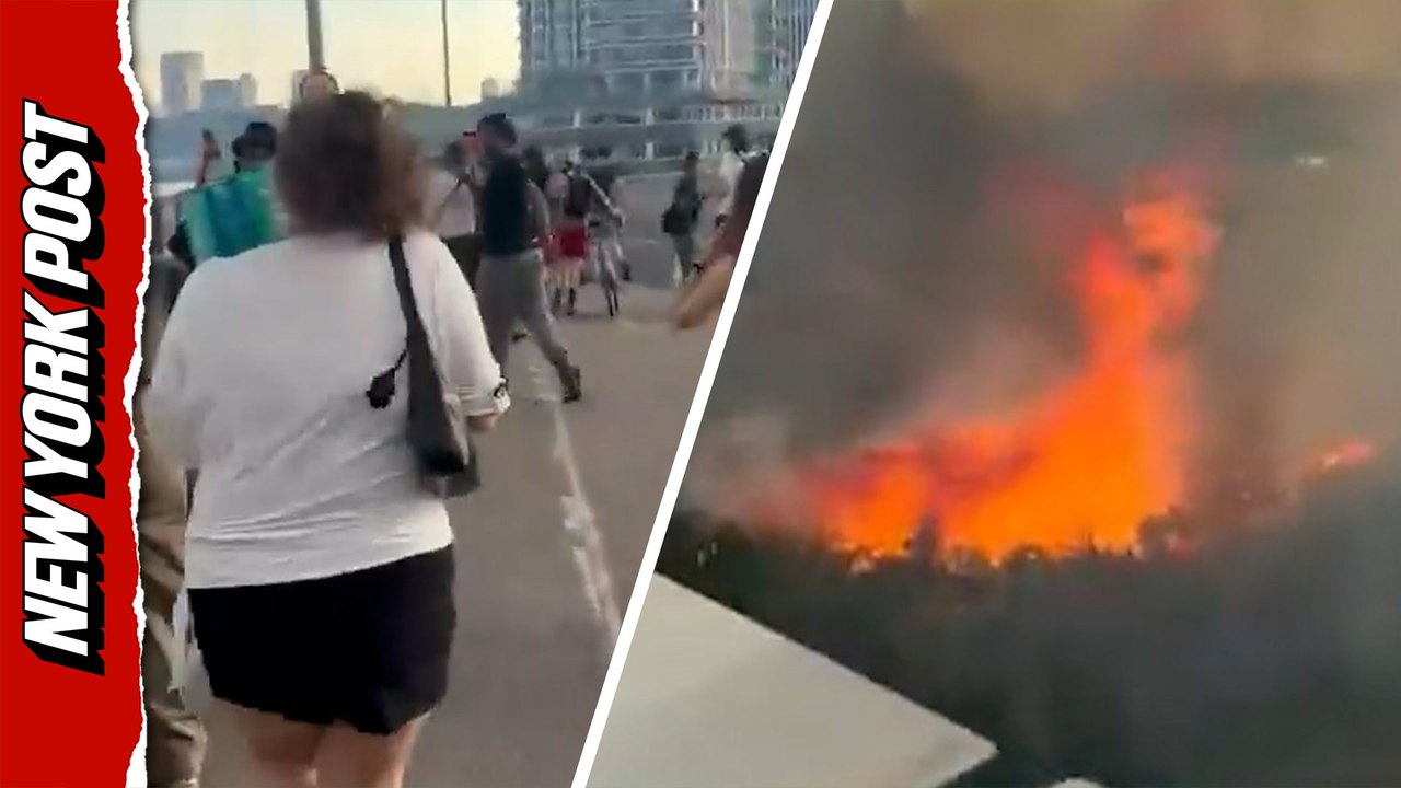 Shocked London locals run from bridge as railway fire explodes