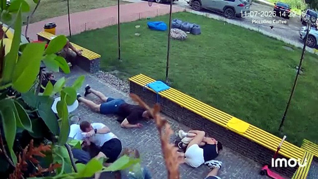CCTV shows woman shielding child from strikes in Ukraine's Sumy
