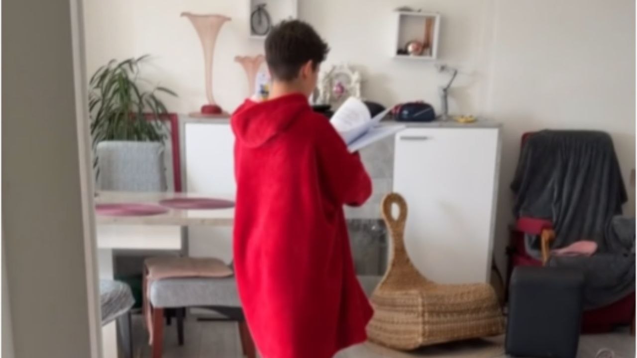 Little Boy Practices Poem On Hoverboard And Ends With A Fall