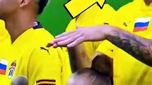 When Players Protect Mascots from the Rain 🌧️❤️⚽