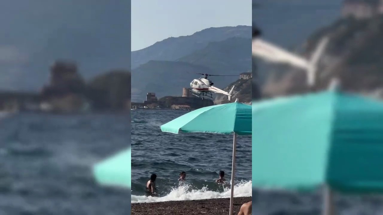Incendio a Bosa, tre elicotteri fanno il pieno d'acqua davanti alla spiaggia di Turas. Il video è impressionante