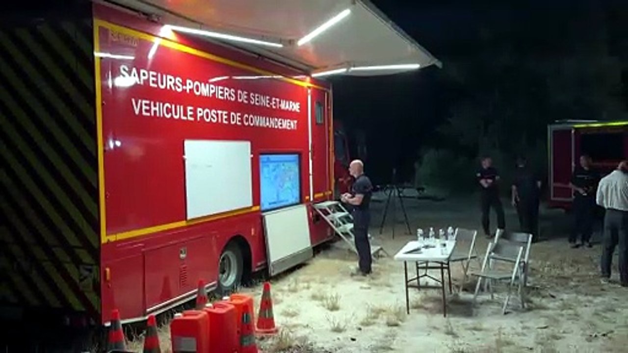 Firefighters tackle wildfire south of Paris as blaze reaches forest