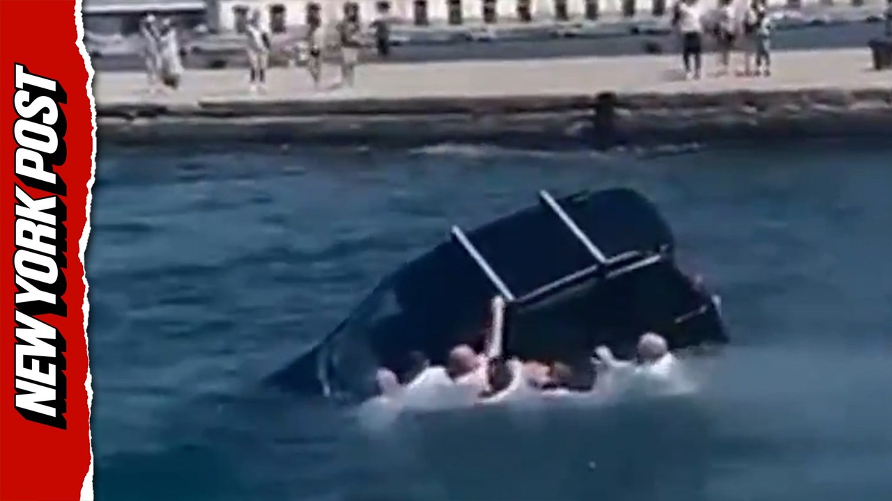 Heroic soldiers rescue driver from sinking car in Italy