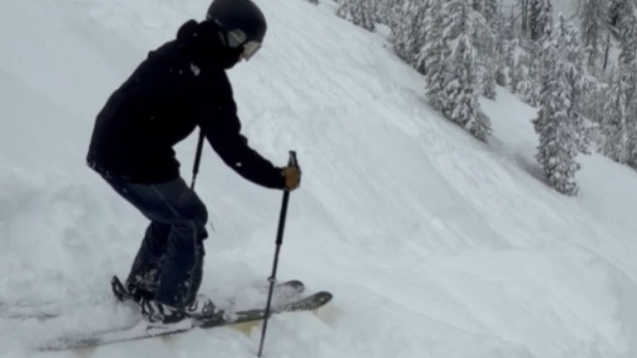 Skier Attempts A Front Flip And Falls In The Snow