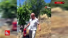 Antalya'da yangını görüp aracındaki yangın tüpüyle muhtemel orman yangınının önüne geçti