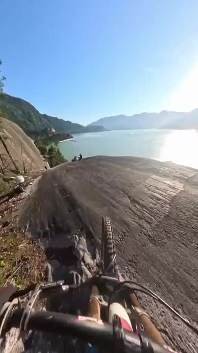 MTB Rider Crashes Into Tree After Jump Attempt on Rocky Terrain