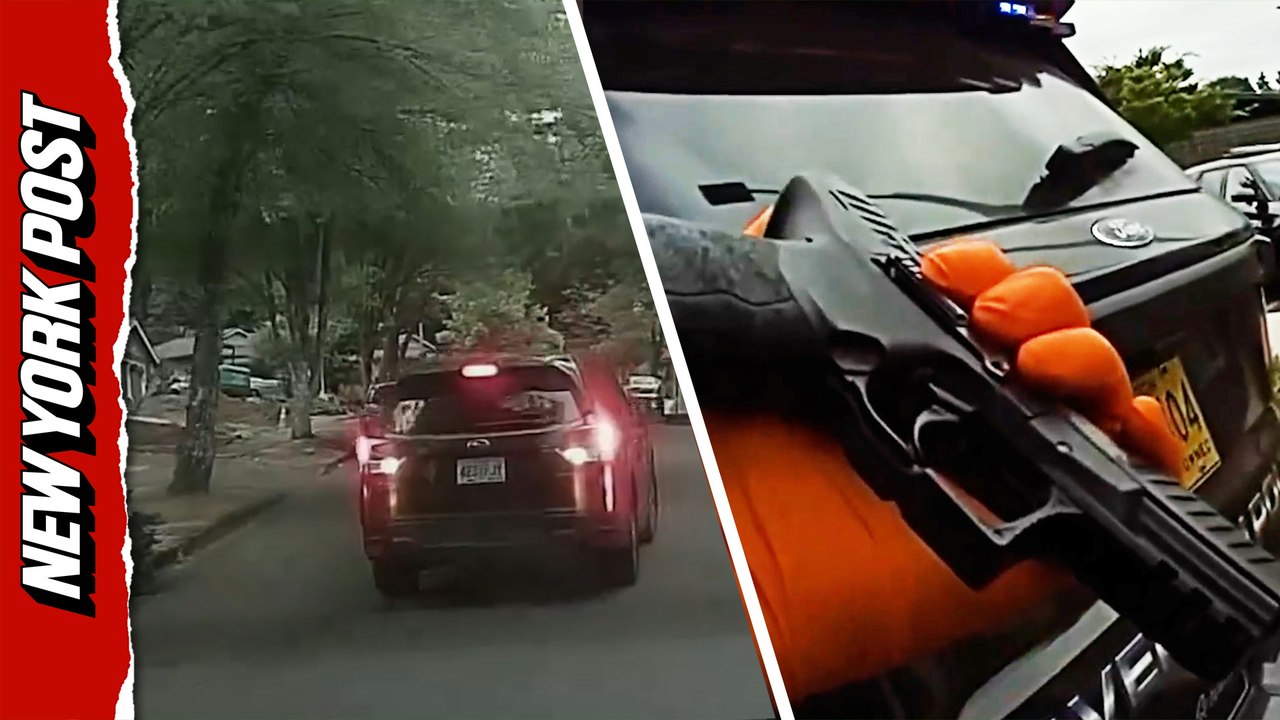Terrifying moment road-rage driver chases couple in reverse