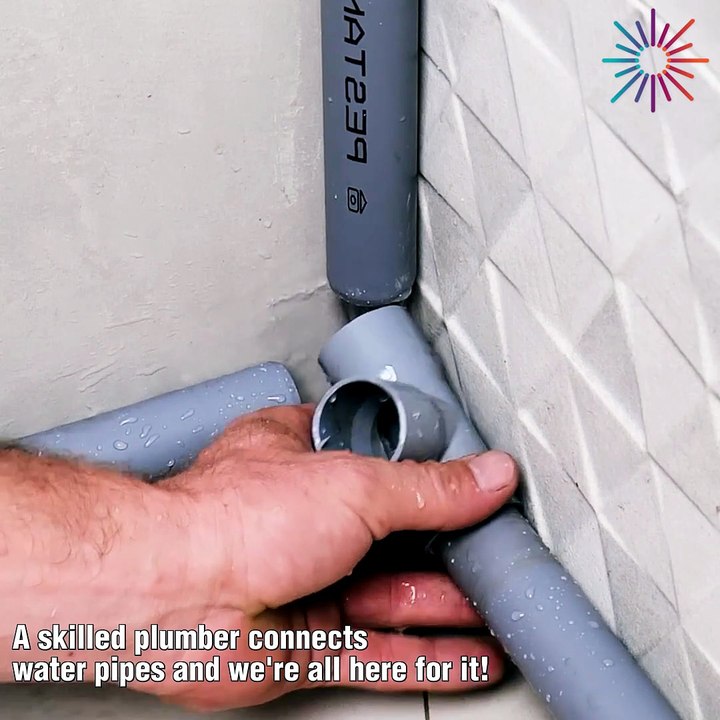A skilled plumber connecting water pipes!