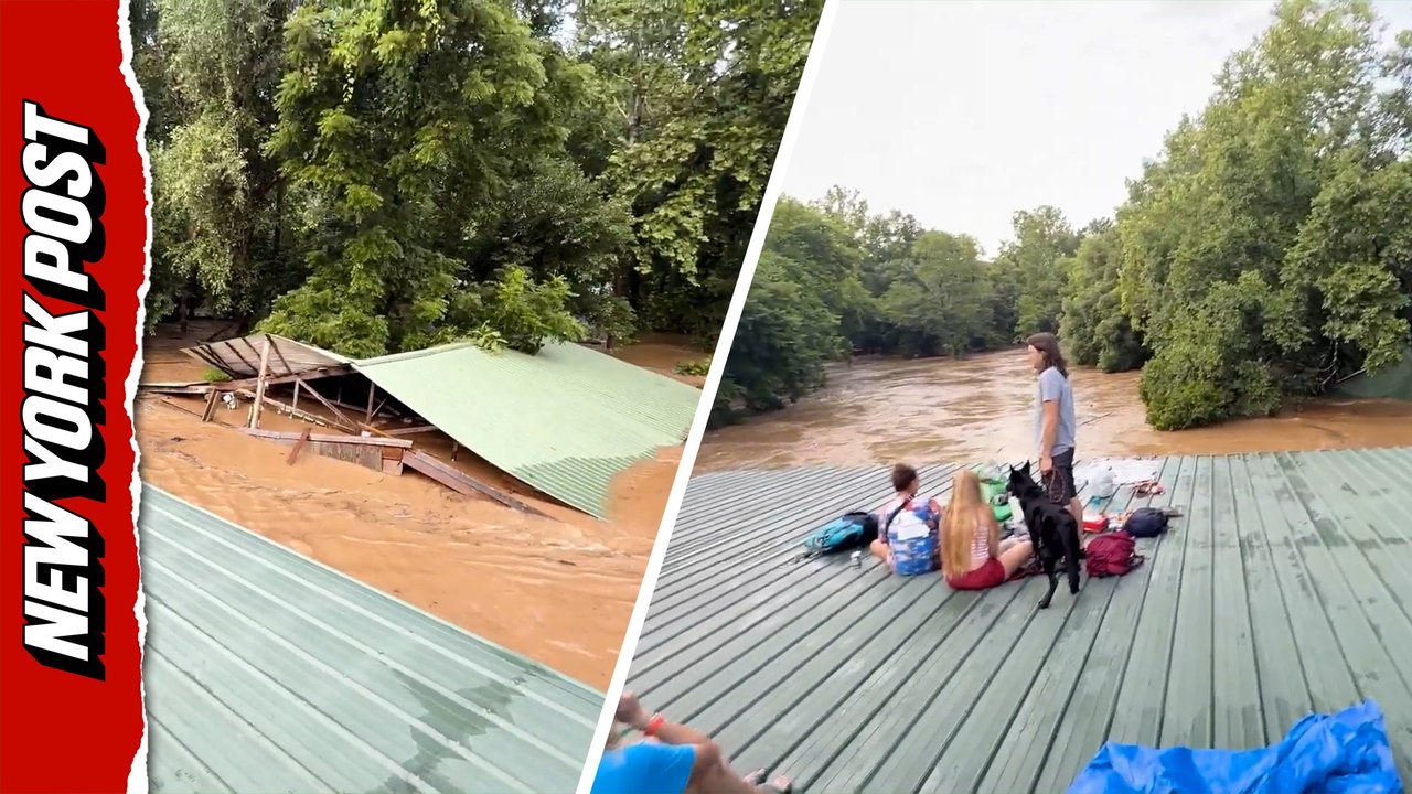 Chilling cries of "help us!" heard as building swept away by flood