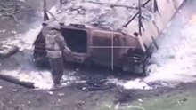 Russian Soldier Seeks Shelter in Burning MT-LB as Drone Watches