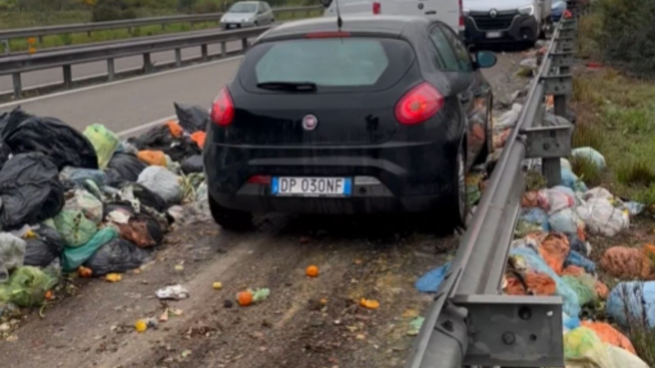 People Clear Road Debris To Let An Ambulance Pass