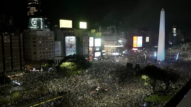 Argentina fans celebrate the World Cup semi-final victory at the Obelisk