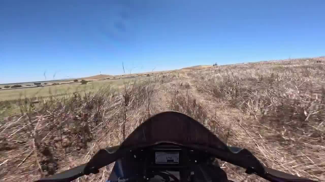 Motorcyclist Goes Off Track After Overtake Attempt