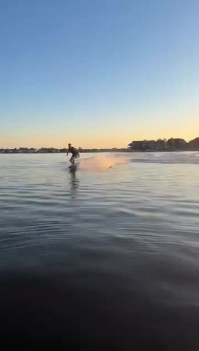 Brother Drenches Sister While Wakeboarding on Lake
