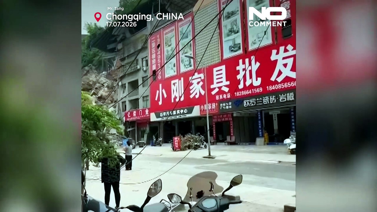 China rescuers race to find trapped people after landslide