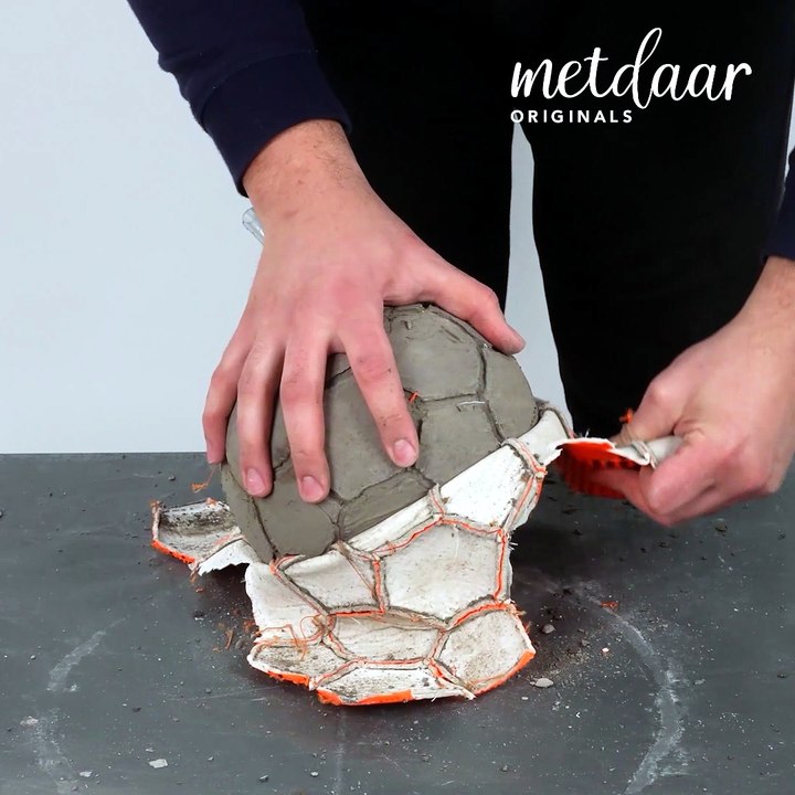 Innovative soccer ball cement waterfall