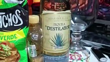 tequila destilador una botella con una pachita y una bolsa de tostachos de la marca Barcel viernes