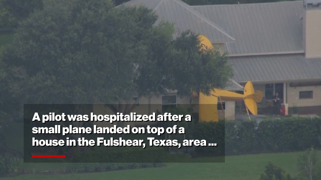 Dramatic scene shows plane on roof of Texas home