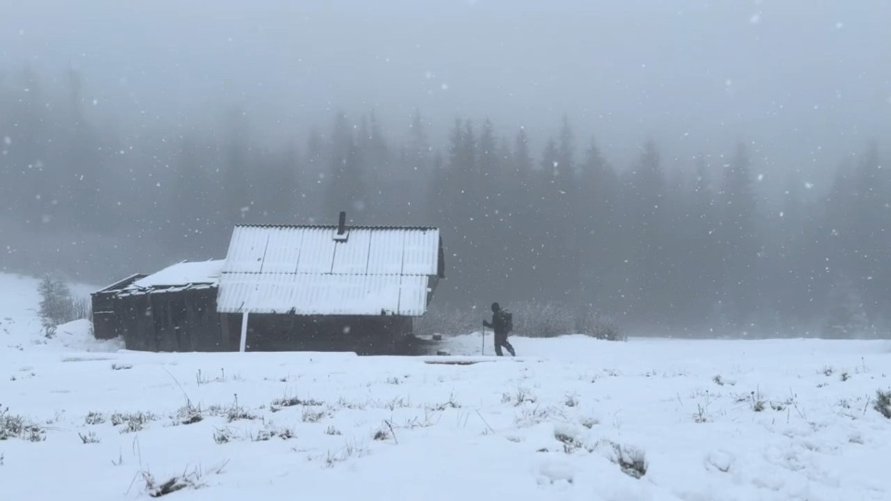 Spend the night in a cozy cabin during a BLIZZARD.