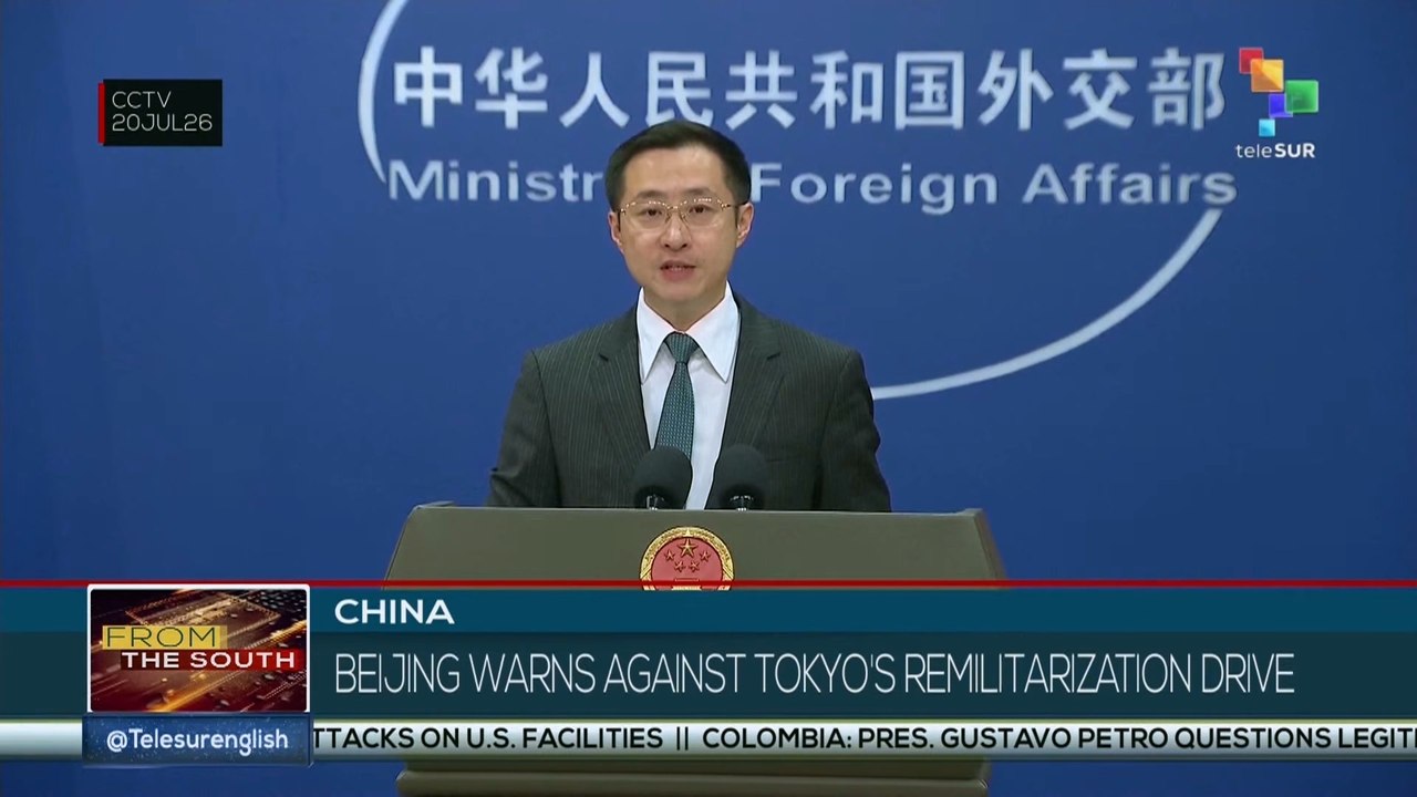 China warns against Japan's remilitarization drive