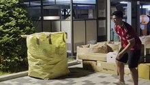 Boy Falls Onto Cardboard Boxes While Running Away With Ball
