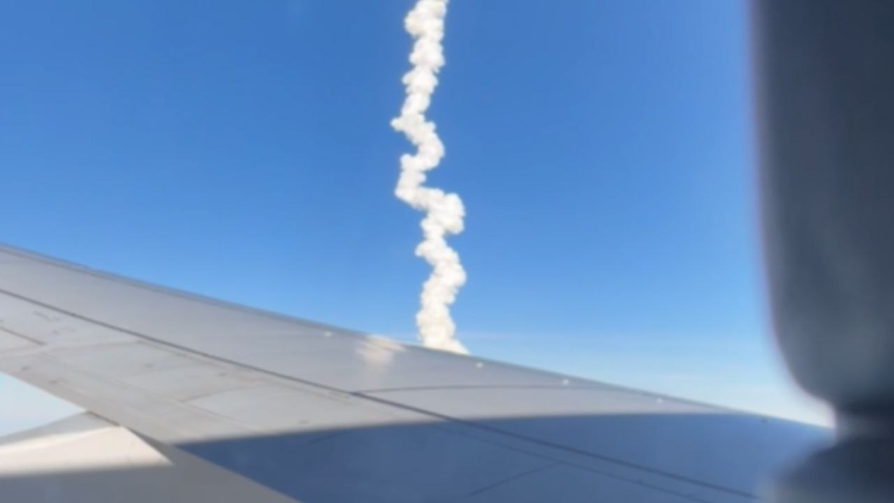 Artemis II Captured From A Plane Above The Clouds