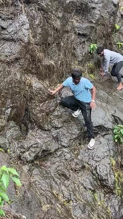 Man Slips On Rocky Slope