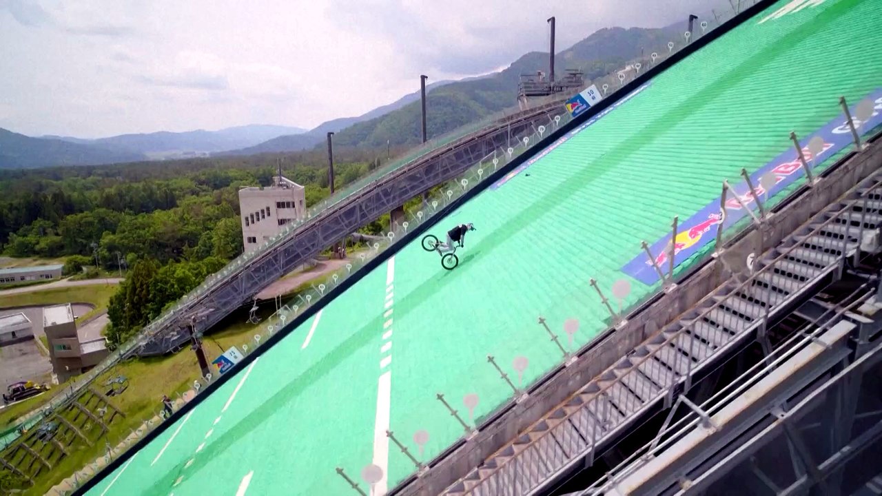 Japanese rider completes world record one wheel descent down ski jump