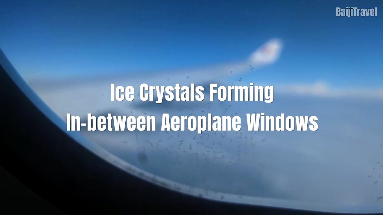 Ice Crystals Forming In-between Aeroplane Windows