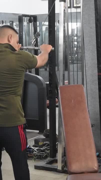 Man Falls While Sitting Down on Bench at Gym