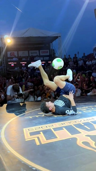 This football stunt may seem easy to do on the fly, but success comes only after years of hard work.