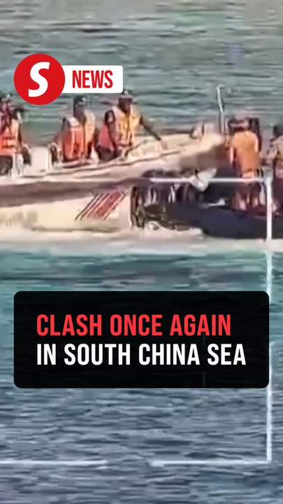 Chinese vessel spraying water cannon at Philippine ship at Scarborough Shoal