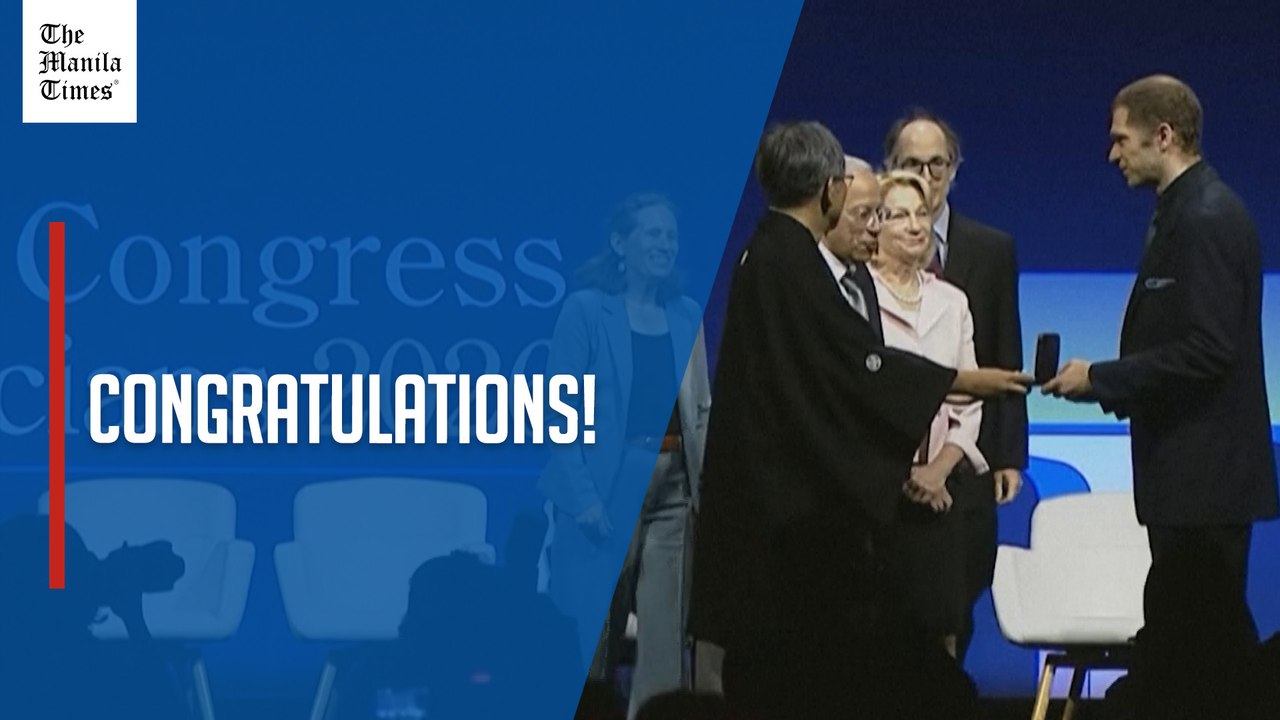 Fields medal awarded to four young mathematicians, including two from China