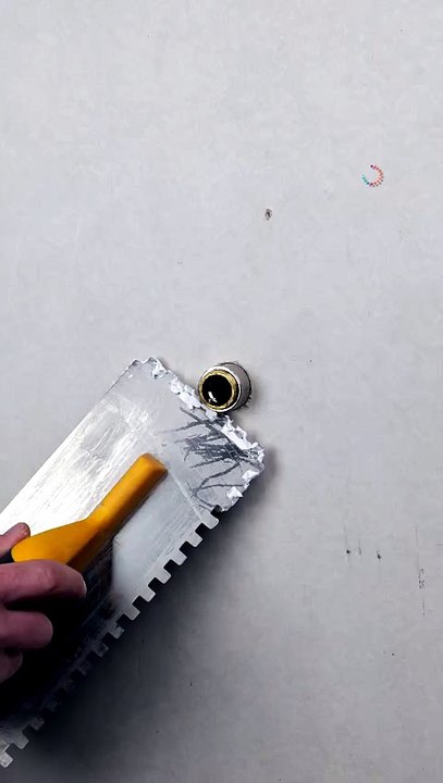Applying drywall mud around the pipe easily