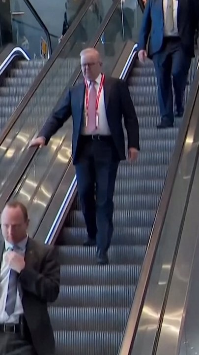 Escalator malfunction leaves Australia's PM swearing
