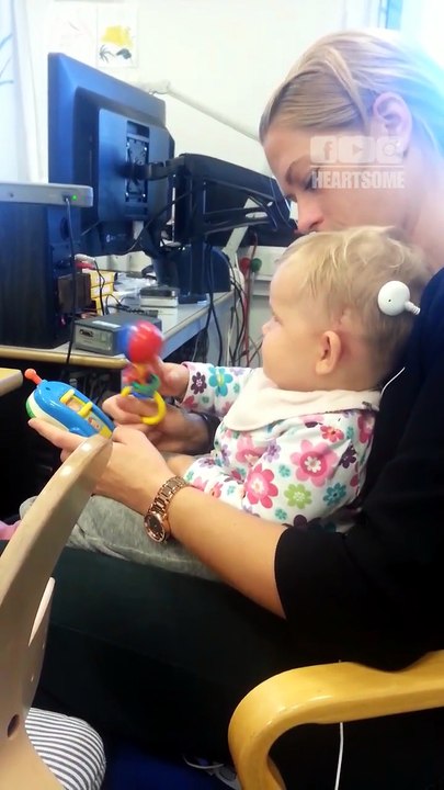 The little girl has a heartwarming moment hearing sound for the first time