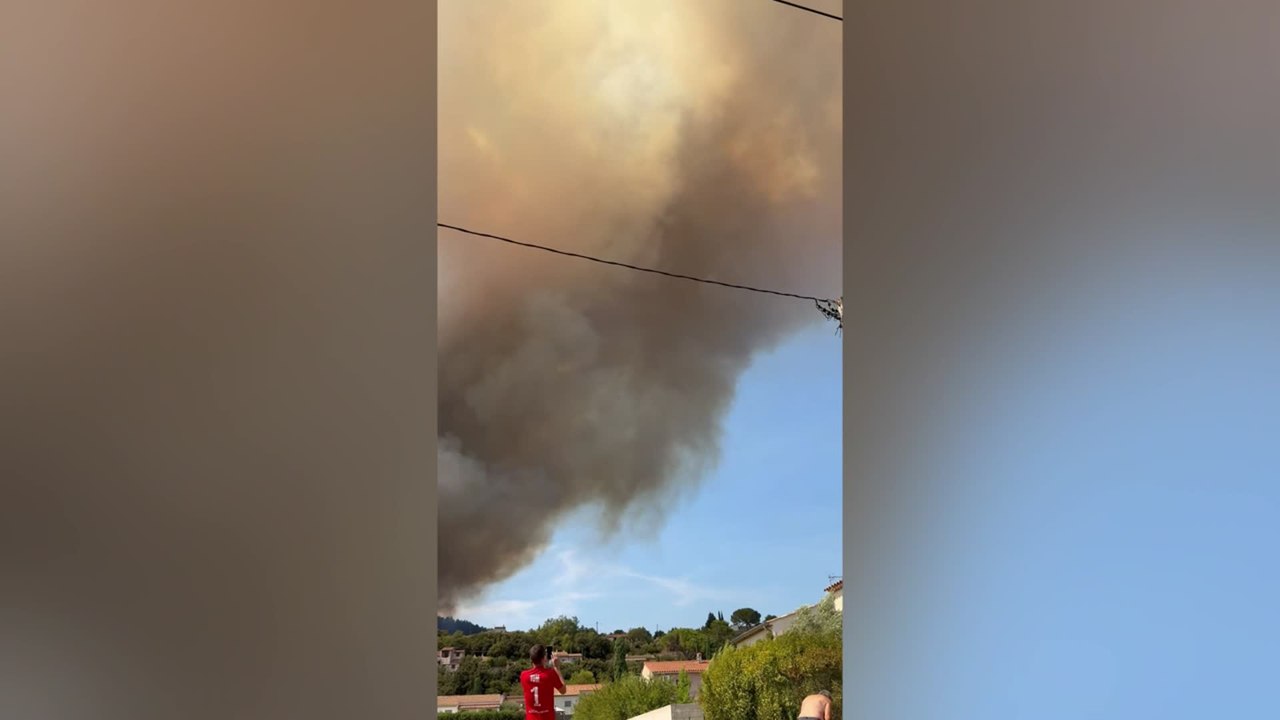 Raging Wildfire Sends Massive Flames Over Hillside in Southern France