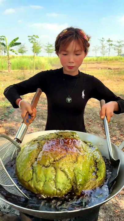 Cooking yummy deep fried cake with sauce