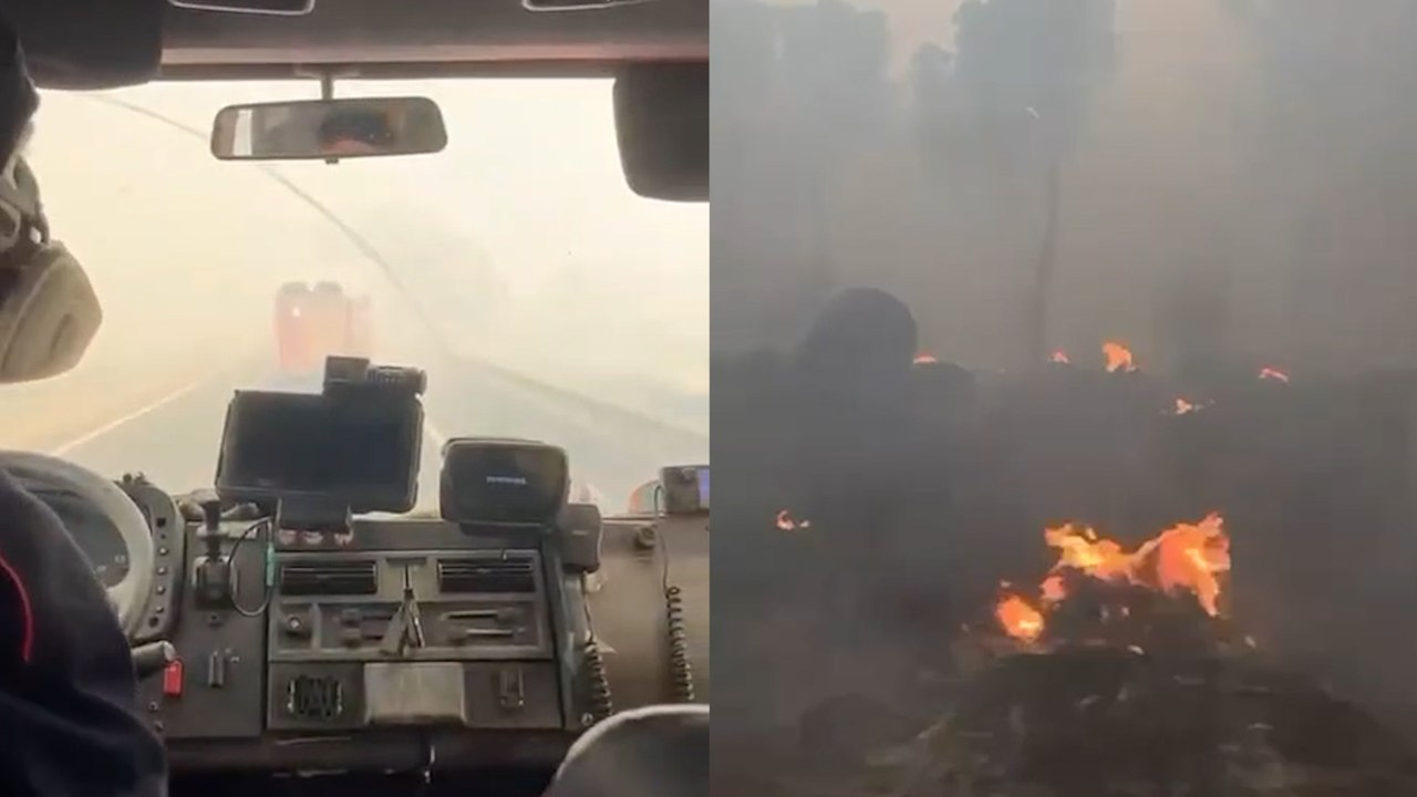 Uno de los incendios vistos desde el interior de un coche de bomberos en dirección a Navas del Rey 