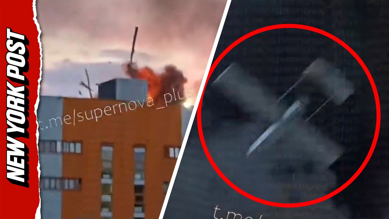 Videographer sent flying after Ukrainian kamikaze drone explodes overhead during Wildberries warehouse attack in Russia