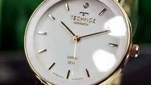 Relógio Technos Feminino 2035MZL 1B 36 Milímetros Dourado e Branco Pulseira em Cerâmica Vidro Safira Prova D´Agua 50m