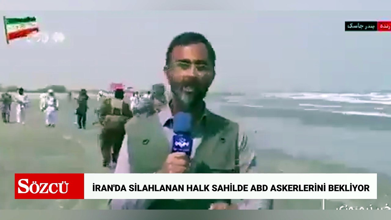 İran'da silahlanan halk sahilde ABD askerlerini bekliyor