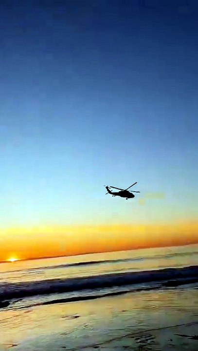 Two Helicopters Flying Into the Sunset 🚁🌅
