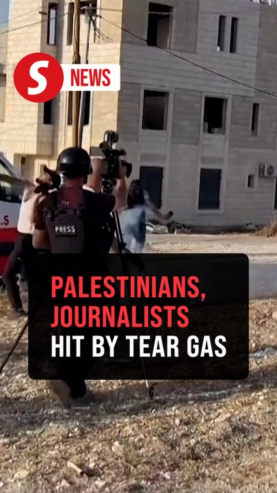 Israeli forces fire tear gas at Palestinians and journalists in area of shootout in West Bank