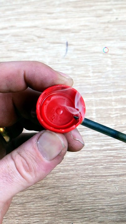 Plastic cup helps repair a damaged charger
