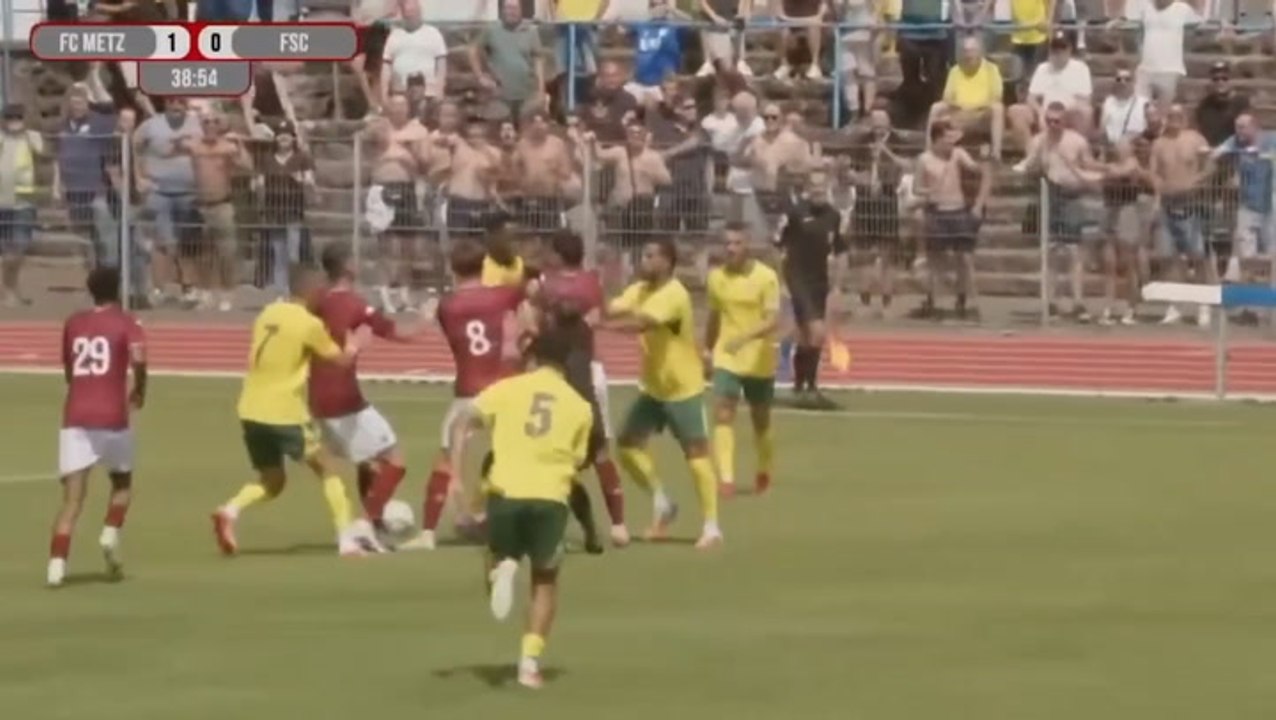 Female football referee concussed after being knocked over by players during brawl